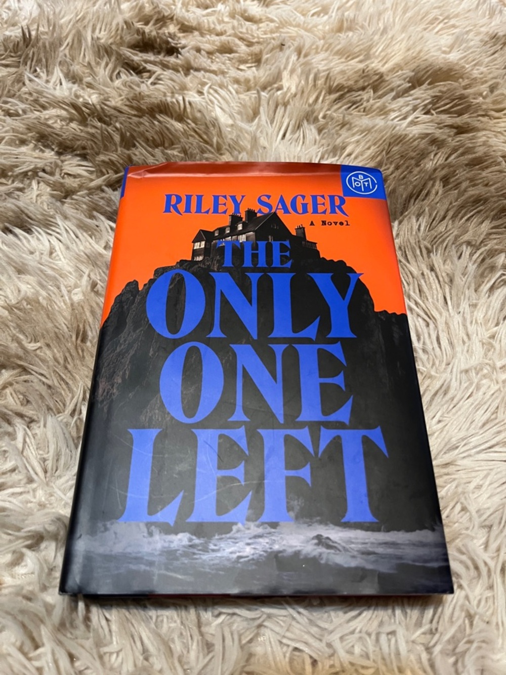 Riley Sager "The Only One Left" Hardcover - Orange and Blue Cover